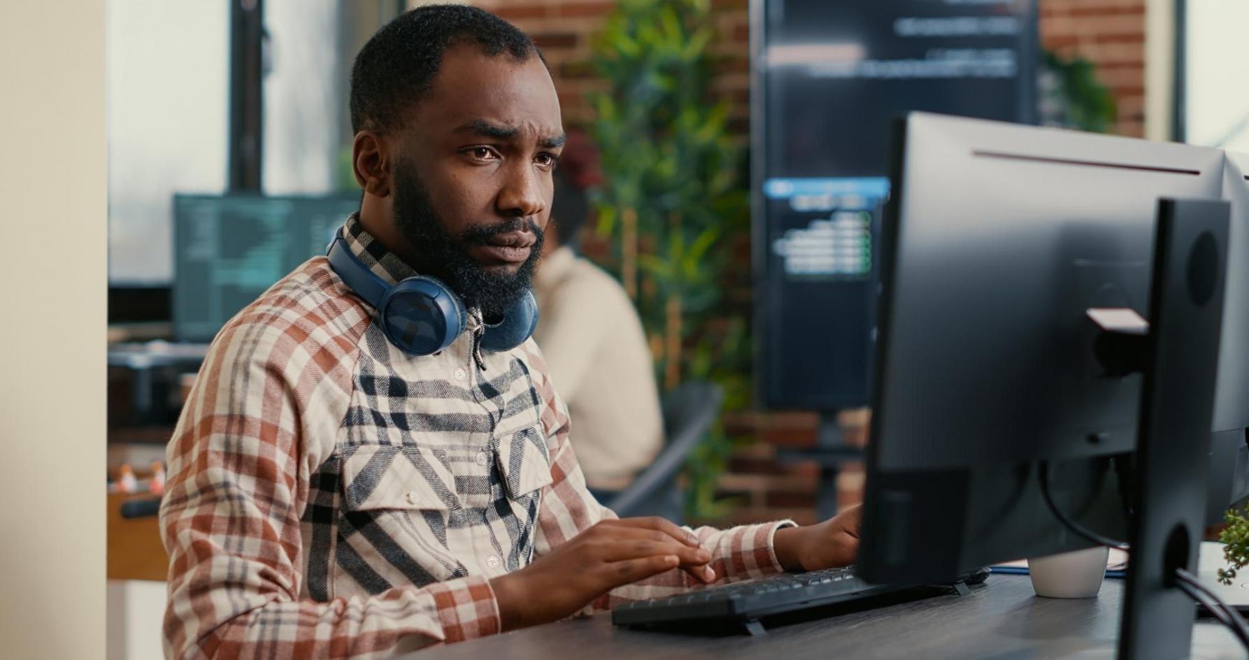 Modern office workspace with financial processing documents