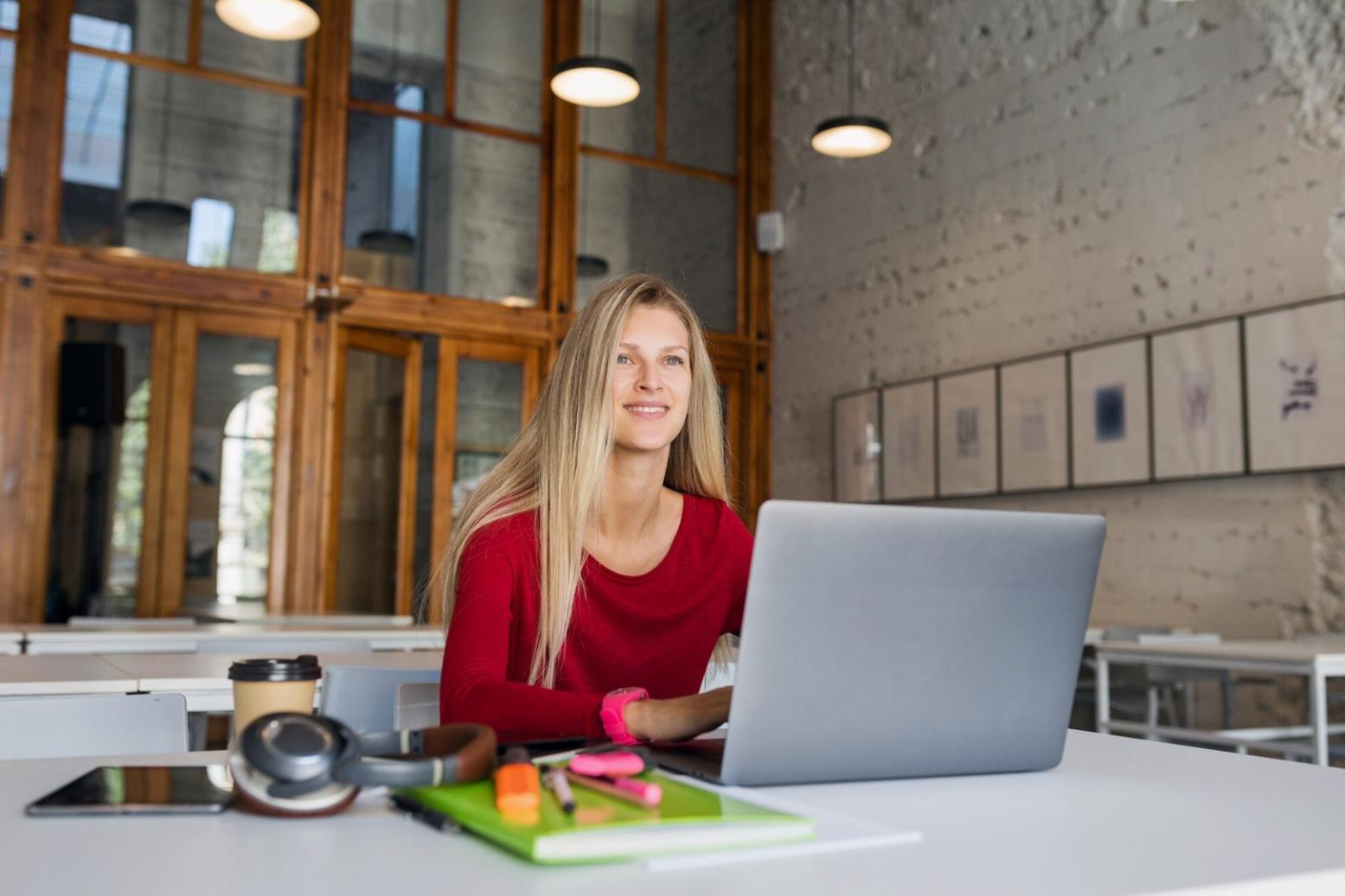 Modern office workspace showing invoice processing automation tools in action
