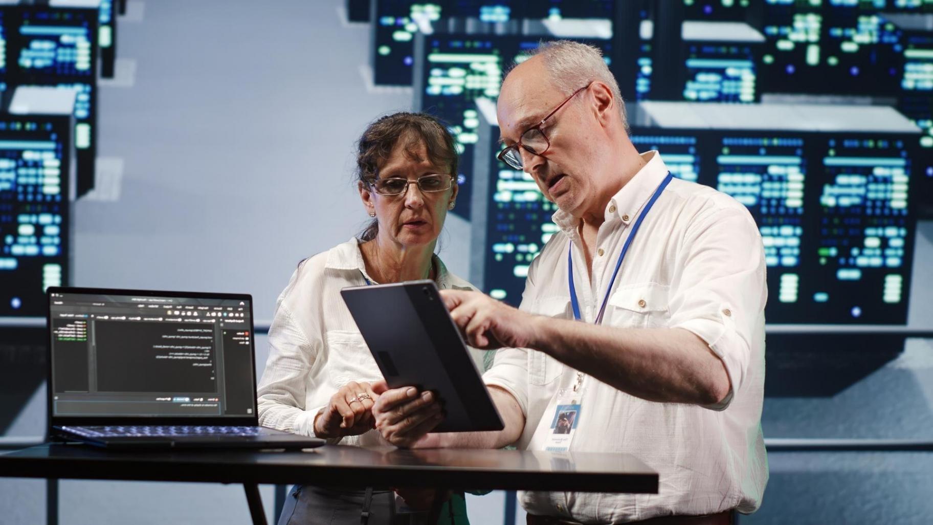 Invoice processing workflow demonstration on computer screens